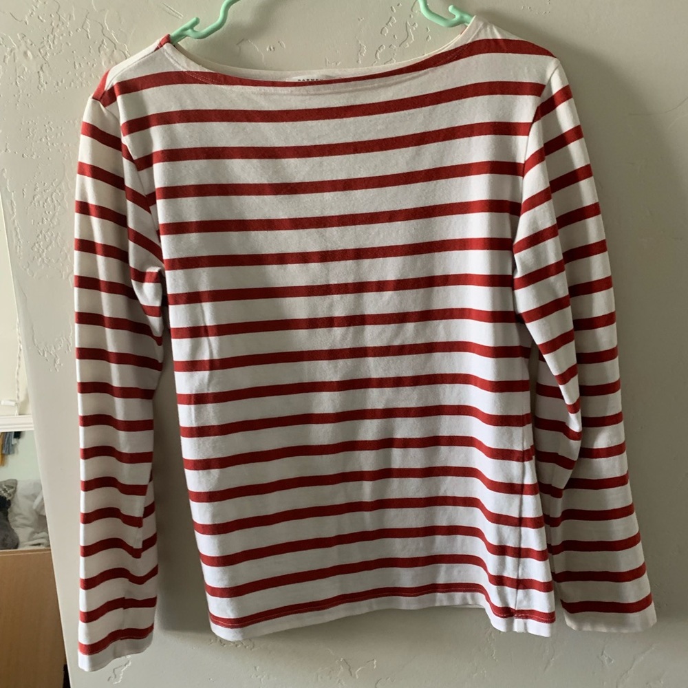 Red and white striped top.